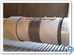 Hřídel generátoru po tryskání její části pro elektro metalizaci - detail